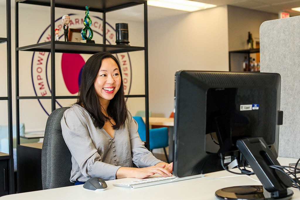 Jing Wu working at her computer