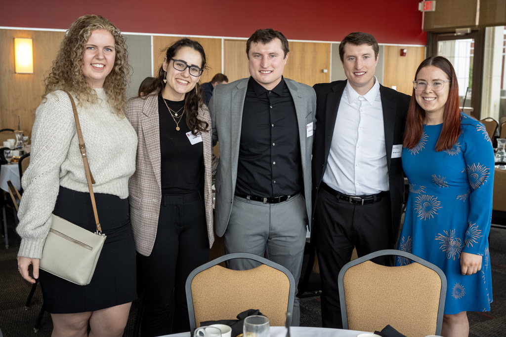 PharmD students smiling arm-in-arm together