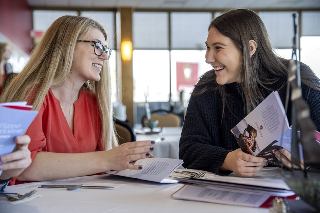 PharmD Student Scholarship Brunch_042021_BGI_5996 PharmD students Alyssa Pitterle (left) talks Cassie Isaacs chats during the 2022 School of Pharmacy Scholarship Brunch