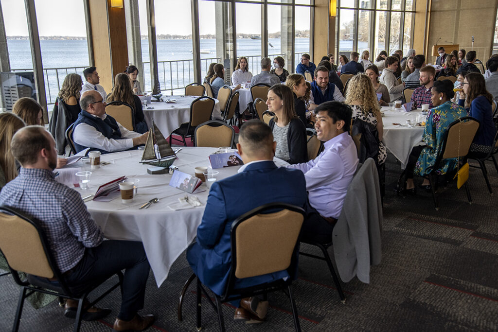 PharmD Student Scholarship Brunch_042021_BGI_6292 Students, family, and friends attend the 2022 School of Pharmacy Scholarship Brunch at the Pyle Center with a beautiful view of Lake Mendota.