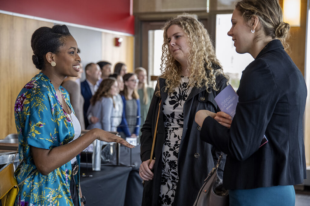 PharmD Student Scholarship Brunch_042021_BGI_6708 Second-year PharmD student Maria Hill chats with Maria Golovkina and Kendall Smith at the School of Pharmacy Scholarship Brunch at the Pyle Center on April 10, 2022