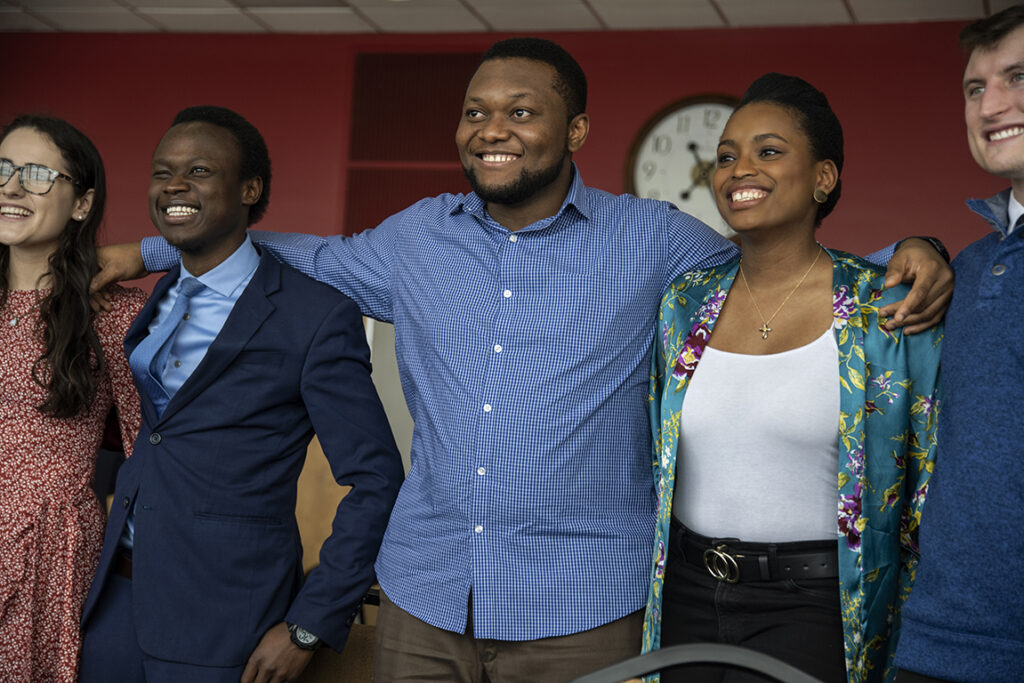 PharmD Student Scholarship Brunch_042021_BGI_6772 PharmD students Caroline Paley, Vincent Elijah, Michael Nome, Maria Hill, and Kane Carstens pose together in the Alumni Lounge at the Pharmacy Scholarship Brunch on April 10, 2022.
