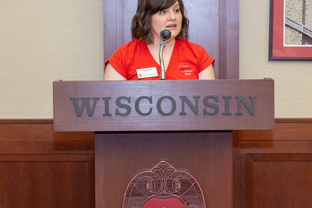 PharmToxCommence-05112019-043 Kendra Gurnee, student service coordinator, congrats students for their achievement at the ceremony.