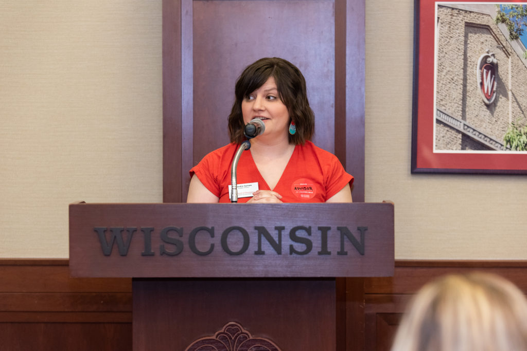 PharmToxCommence-05112019-054 Kendra Gurnee, student service coordinator, congrats students for their achievement at the ceremony.