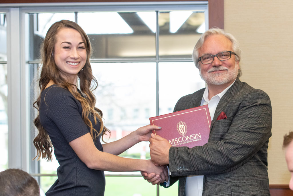 PharmToxCommence-05112019-055 Students receive their diploma from Professor Jeff Johnson.
