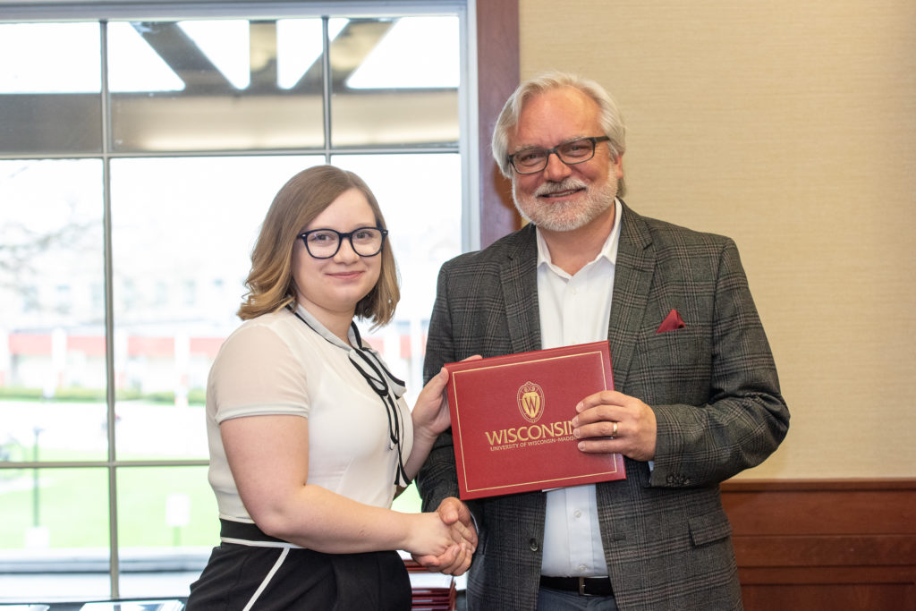 PharmToxCommence-05112019-063 Students receive their diploma from Professor Jeff Johnson.