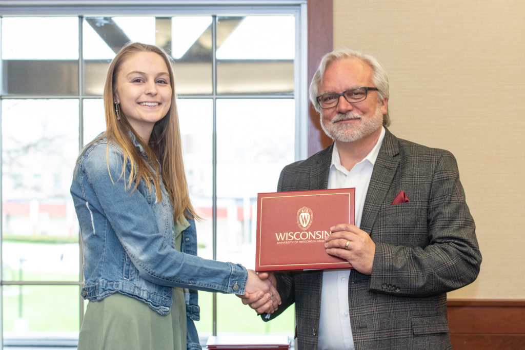 PharmToxCommence-05112019-064 Students receive their diploma from Professor Jeff Johnson.