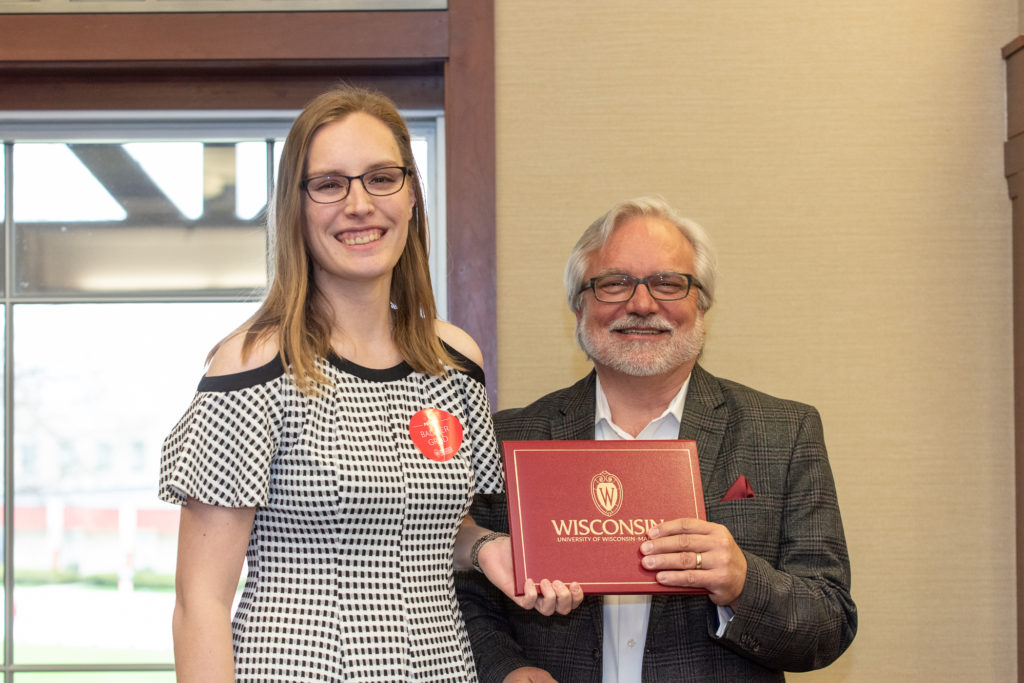PharmToxCommence-05112019-065 Students receive their diploma from Professor Jeff Johnson.