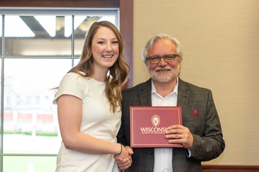 PharmToxCommence-05112019-066 Students receive their diploma from Professor Jeff Johnson.