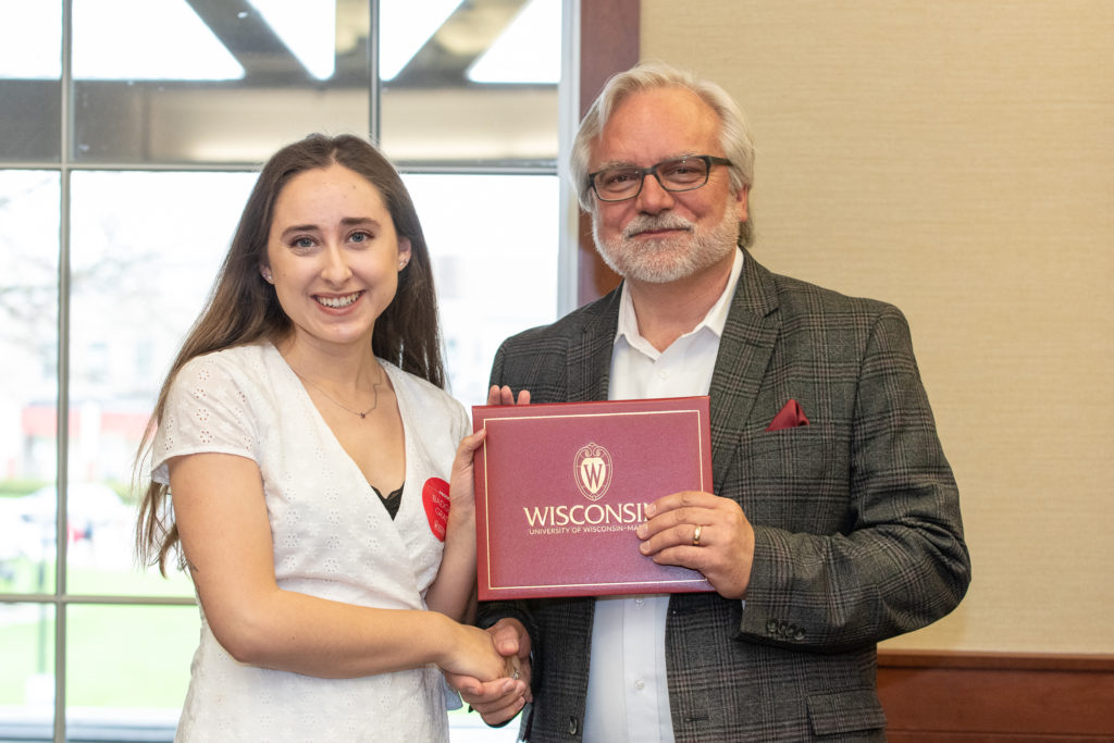 PharmToxCommence-05112019-068 Students receive their diploma from Professor Jeff Johnson.