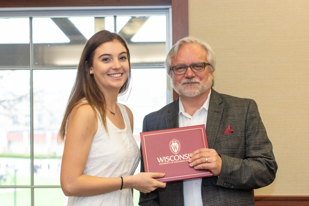 PharmToxCommence-05112019-073 Students receive their diploma from Professor Jeff Johnson.