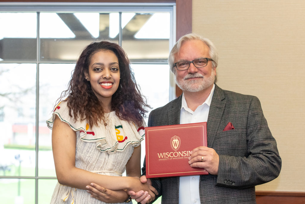 PharmToxCommence-05112019-076 Students receive their diploma from Professor Jeff Johnson.