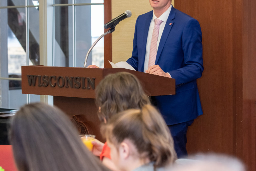 PharmToxCommence-05112019-080 Nathaniel Smith, the president of Pharmacy Alumni Association, delivers his speech to congrat students and welcome them as alumni.
