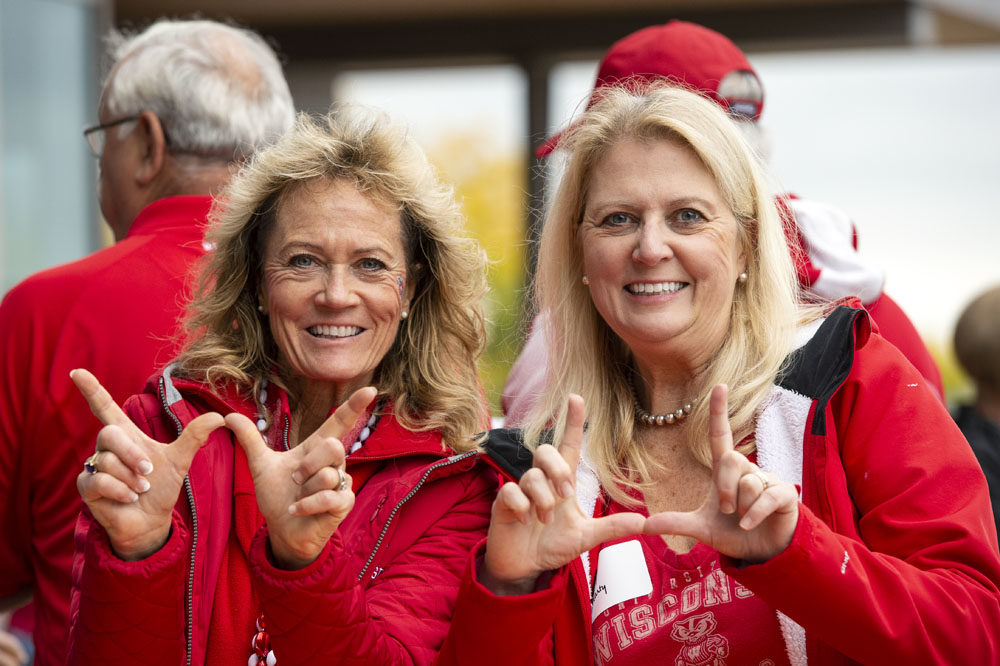 PharmacyAlumniTailgateEvent_1018_DSC_6409 Alumni showing Badger pride at the UW-Madison Pharmacy Alumni Tailgate event, held at Union South during the Badgers vs. Cornhuskers game.