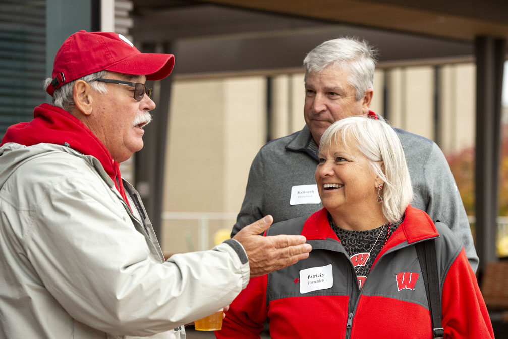 PharmacyAlumniTailgateEvent_1018_DSC_6467 Alumni catching up at the UW-Madison Pharmacy Alumni Tailgate event, held at Union South during the Badgers vs. Cornhuskers game.