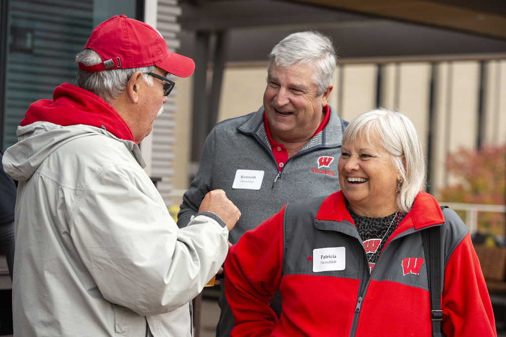 PharmacyAlumniTailgateEvent_1018_DSC_6473 Alumni catching up at the UW-Madison Pharmacy Alumni Tailgate event, held at Union South during the Badgers vs. Cornhuskers game.