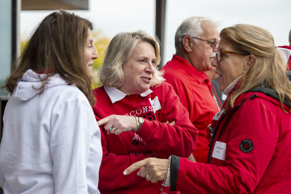 PharmacyAlumniTailgateEvent_1018_DSC_6510 Alumni catching up at the UW-Madison Pharmacy Alumni Tailgate event, held at Union South during the Badgers vs. Cornhuskers game.