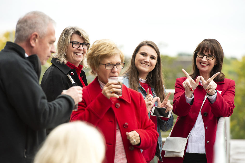 PharmacyAlumniTailgateEvent_1018_DSC_6528 Alumni catching up at the UW-Madison Pharmacy Alumni Tailgate event, held at Union South during the Badgers vs. Cornhuskers game.