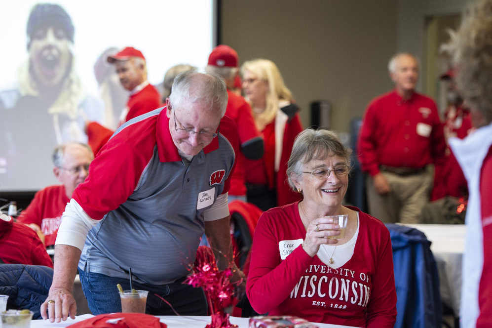PharmacyAlumniTailgateEvent_1018_DSC_6542 Alumni catching up at the UW-Madison Pharmacy Alumni Tailgate event, held at Union South during the Badgers vs. Cornhuskers game.