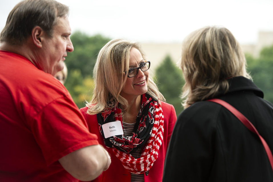 PharmacyAlumniTailgateEvent_1018_DSC_6637 Alumni catching up at the UW-Madison Pharmacy Alumni Tailgate event, held at Union South during the Badgers vs. Cornhuskers game.