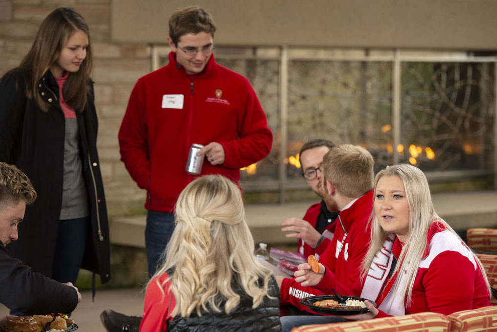 PharmacyAlumniTailgateEvent_1018_DSC_6693 Alumni catching up at the UW-Madison Pharmacy Alumni Tailgate event, held at Union South during the Badgers vs. Cornhuskers game.