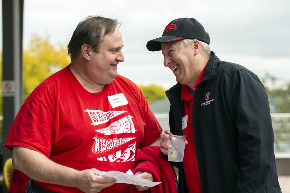 PharmacyAlumniTailgateEvent_1018_DSC_6755 Alumni catching up at the UW-Madison Pharmacy Alumni Tailgate event, held at Union South during the Badgers vs. Cornhuskers game.
