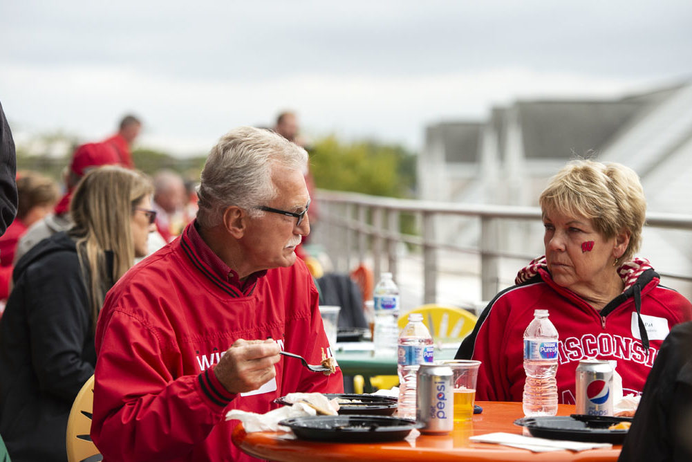 PharmacyAlumniTailgateEvent_1018_DSC_6783 Alumni catching up at the UW-Madison Pharmacy Alumni Tailgate event, held at Union South during the Badgers vs. Cornhuskers game.