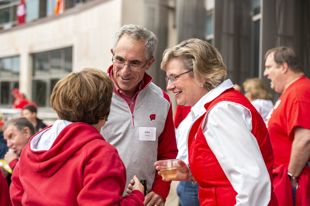 PharmacyAlumniTailgateEvent_1018_DSC_6837 Alumni catching up at the UW-Madison Pharmacy Alumni Tailgate event, held at Union South during the Badgers vs. Cornhuskers game.