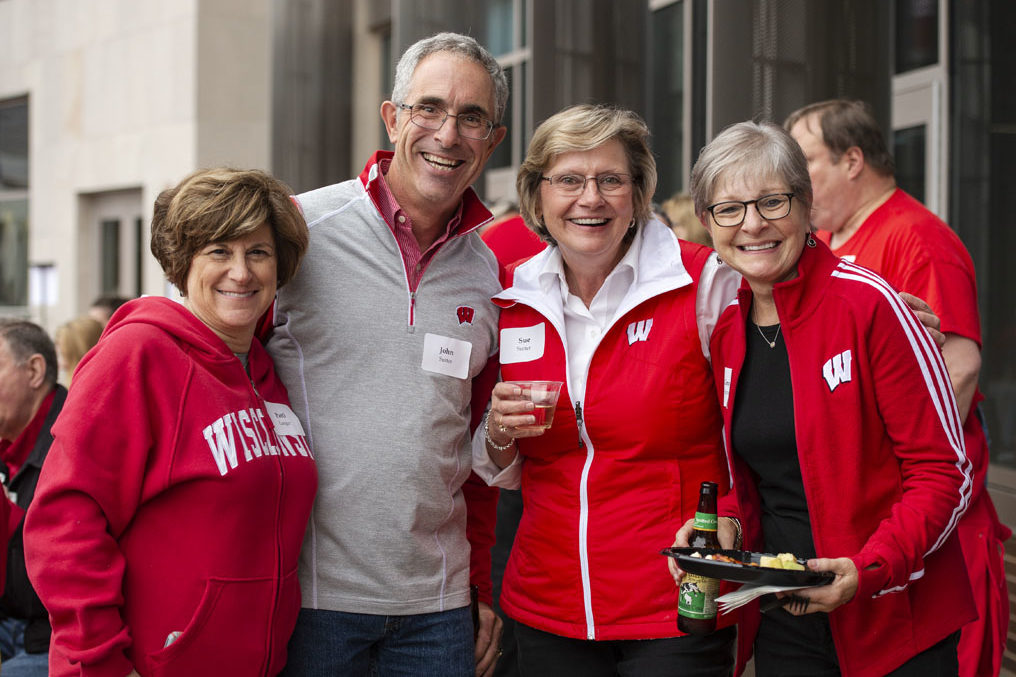 PharmacyAlumniTailgateEvent_1018_DSC_6872 Alumni catching up at the UW-Madison Pharmacy Alumni Tailgate event, held at Union South during the Badgers vs. Cornhuskers game.