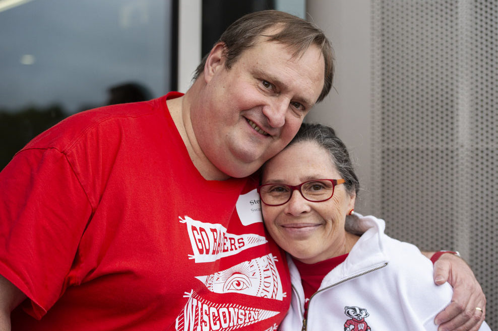 PharmacyAlumniTailgateEvent_1018_DSC_6886 Alumni catching up at the UW-Madison Pharmacy Alumni Tailgate event, held at Union South during the Badgers vs. Cornhuskers game.