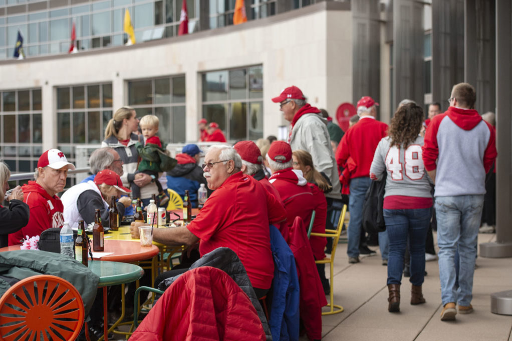 PharmacyAlumniTailgateEvent_1018_DSC_6930 Alumni catching up at the UW-Madison Pharmacy Alumni Tailgate event, held at Union South during the Badgers vs. Cornhuskers game.