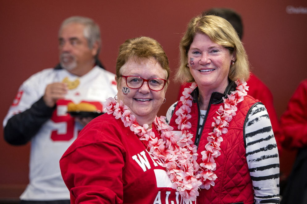 PharmacyAlumniTailgateEvent_1018_DSC_7020 Alumni catching up at the UW-Madison Pharmacy Alumni Tailgate event, held at Union South during the Badgers vs. Cornhuskers game.