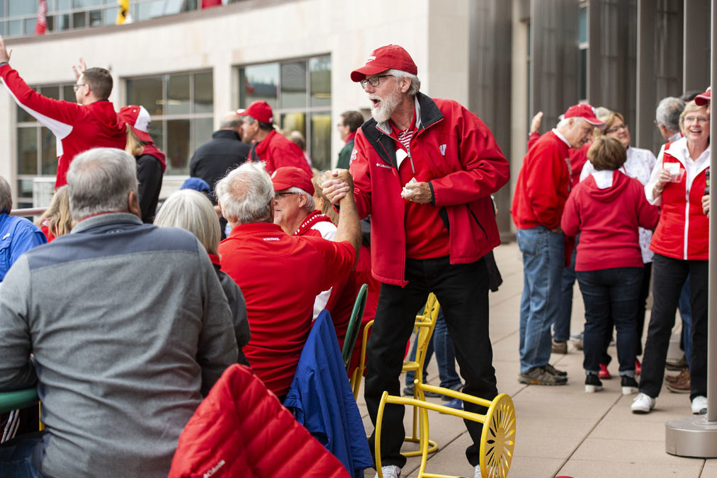 PharmacyAlumniTailgateEvent_1018_DSC_7114 Alumni catching up at the UW-Madison Pharmacy Alumni Tailgate event, held at Union South during the Badgers vs. Cornhuskers game.