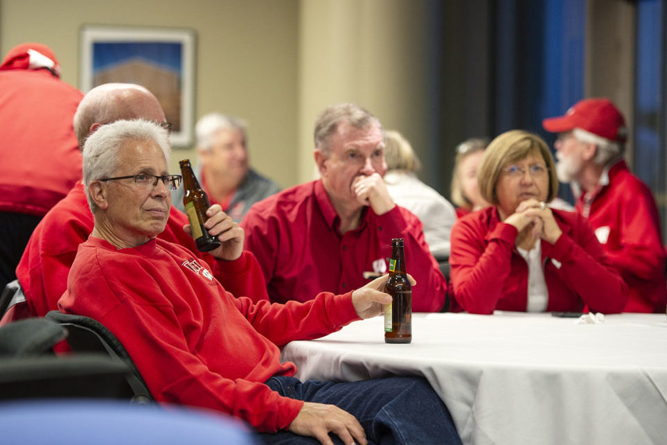 PharmacyAlumniTailgateEvent_1018_DSC_7526 Alumni watching the Badgers vs. Cornhuskers game at the UW-Madison Pharmacy Alumni Tailgate event, held at Union South.