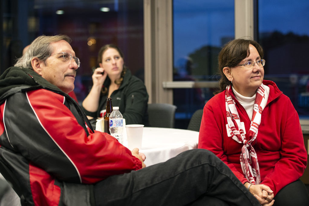 PharmacyAlumniTailgateEvent_1018_DSC_7533 Alumni watching the Badgers vs. Cornhuskers game at the UW-Madison Pharmacy Alumni Tailgate event, held at Union South.