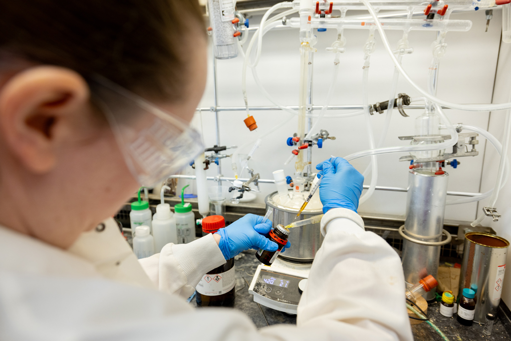 Jillian Kyzer, a medicinal chemist and staff scientist in the Wenthur Lab, synthesizes a click chemistry reaction to form probes for receptors and the reward center of the brain.