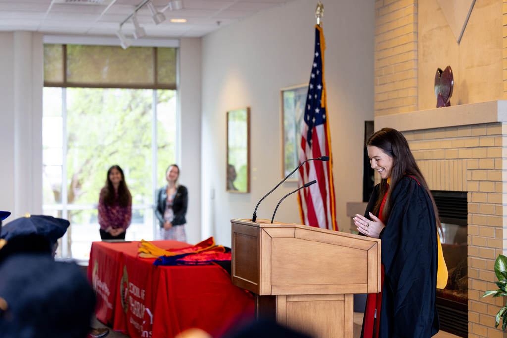Pharmacy_Graduation_2024_092 Mika Hess speaks at the podium