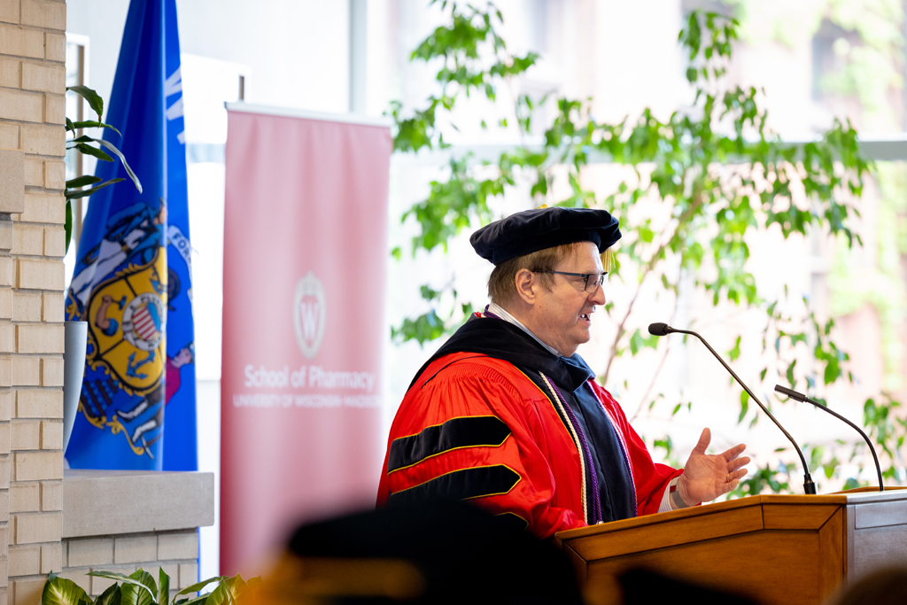Pharmacy_Graduation_2024_107 Dean Steve Swanson speaks at the podium