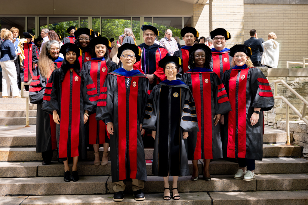 Pharmacy_Graduation_2024_114 Faculty and graduates pose with Roger Tung