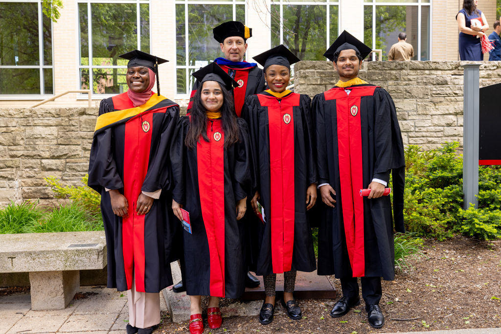 Pharmacy_Graduation_2024_125 Applied Drug Development graduates pose with Associate Professor Eric Buxton