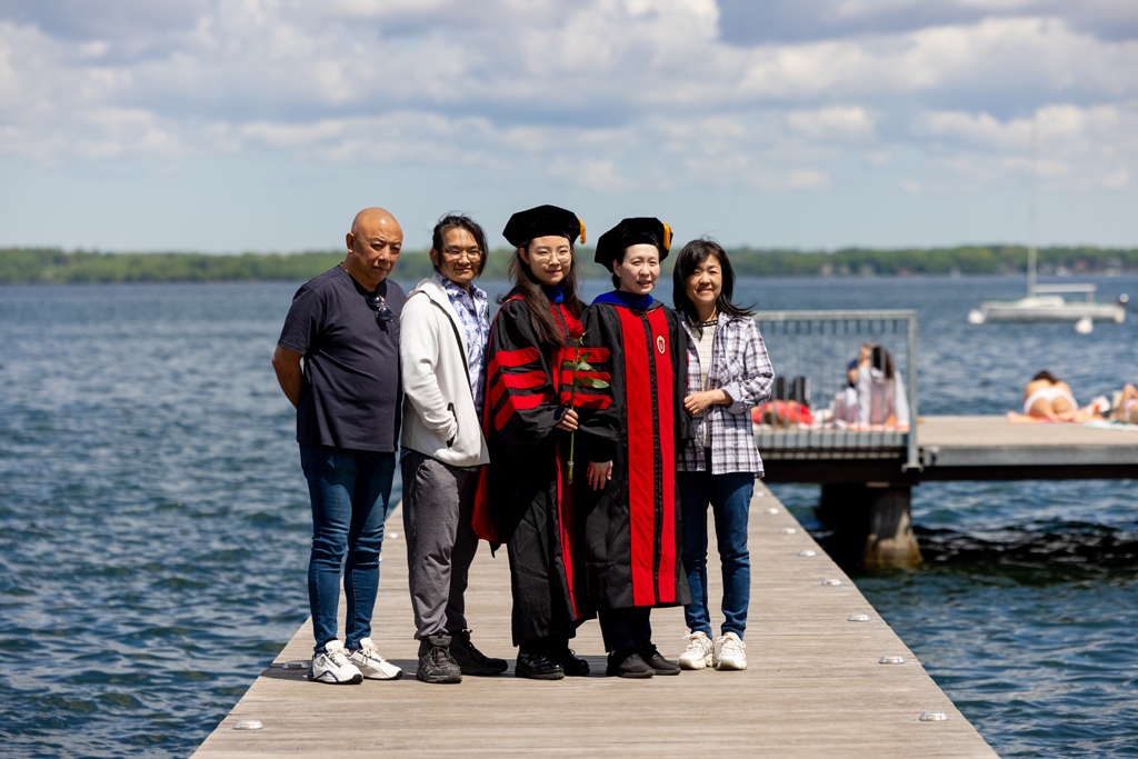 Pharmacy_Graduation_2024_141 Jiaoyang Jiang poses with a graduate
