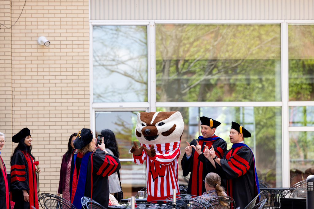 Pharmacy_Graduation_2024_145 Bucky and faculty pose