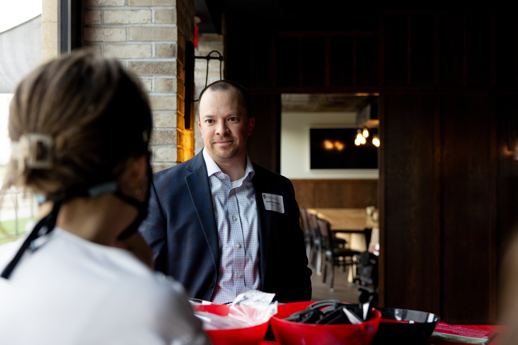 Jason Bergsbaken at the check-in table