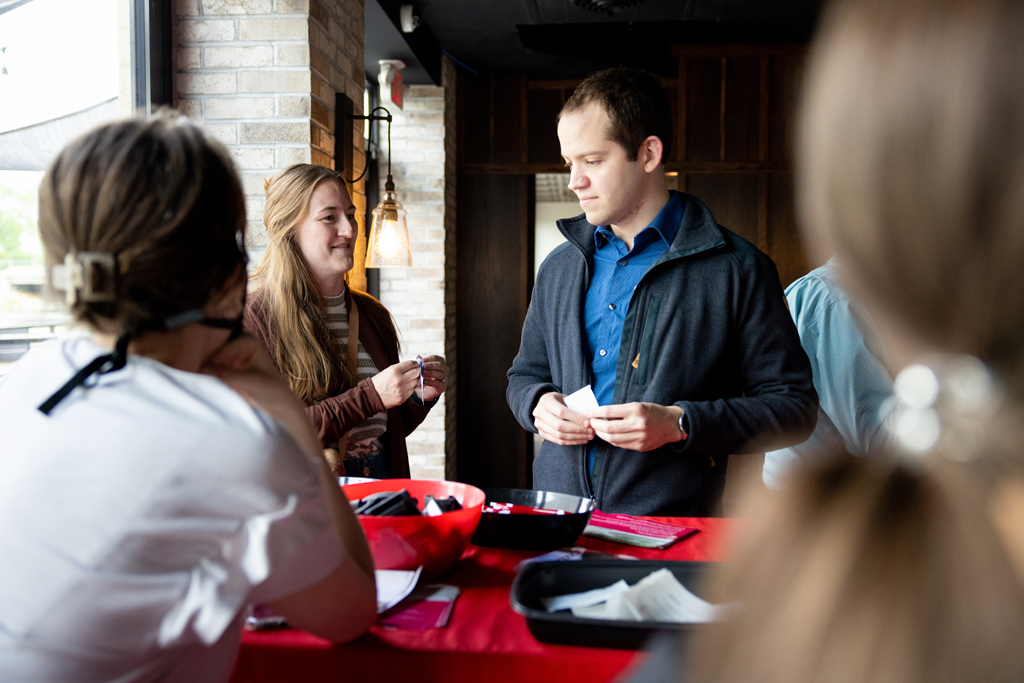 Alumni at the check-in table