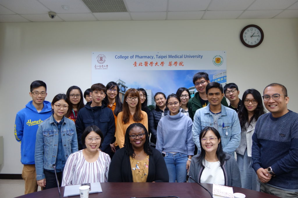 Research presentation TMU Olayinka Shiyanbola with faculty from Taipei Medical University