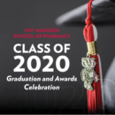 Graduation cap and tassle with Bucky Badger figurine