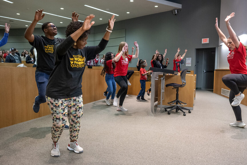 The Wonders of Pharmacy_032024_PLNZ72_6896 High Fitness Instructor Chelsea Carvajal from the Princeton Club helped the crowd move their body during the CRoMe Lab Station - Dance is Medicine activity during the Wonders of Pharmacy on Saturday, March 2, 2024, at the School of Pharmacy on the campus of UW-Madison. (Photo Paul L. Newby, II)
