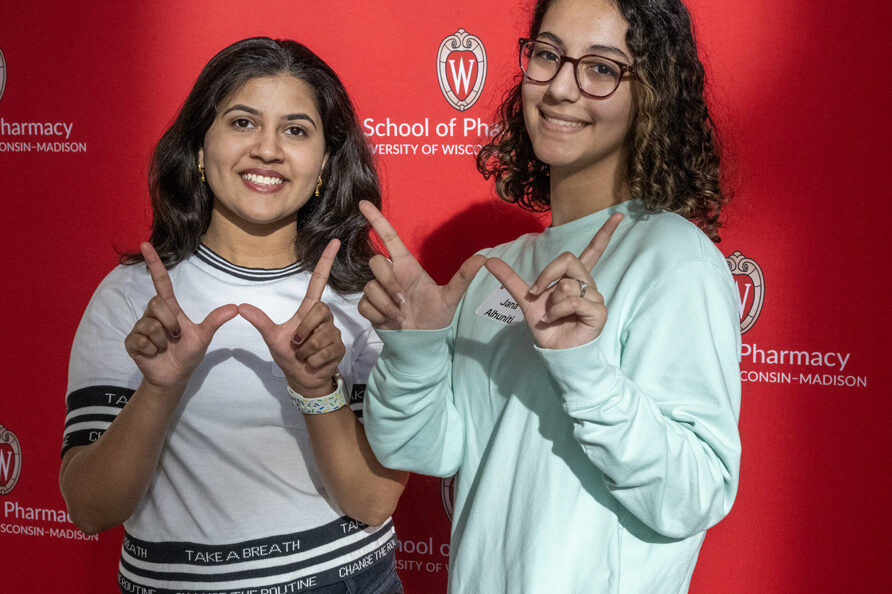 The Wonders of Pharmacy_032024_PLNZ72_8070 After a busy and fantastic day of exploring, Jiya Naik, left, and her friend Jana Alhniti grab a photo during the Wonders of Pharmacy on Saturday, March 2, 2024, at the School of Pharmacy on the campus of UW-Madison. (Photo Paul L. Newby, II)