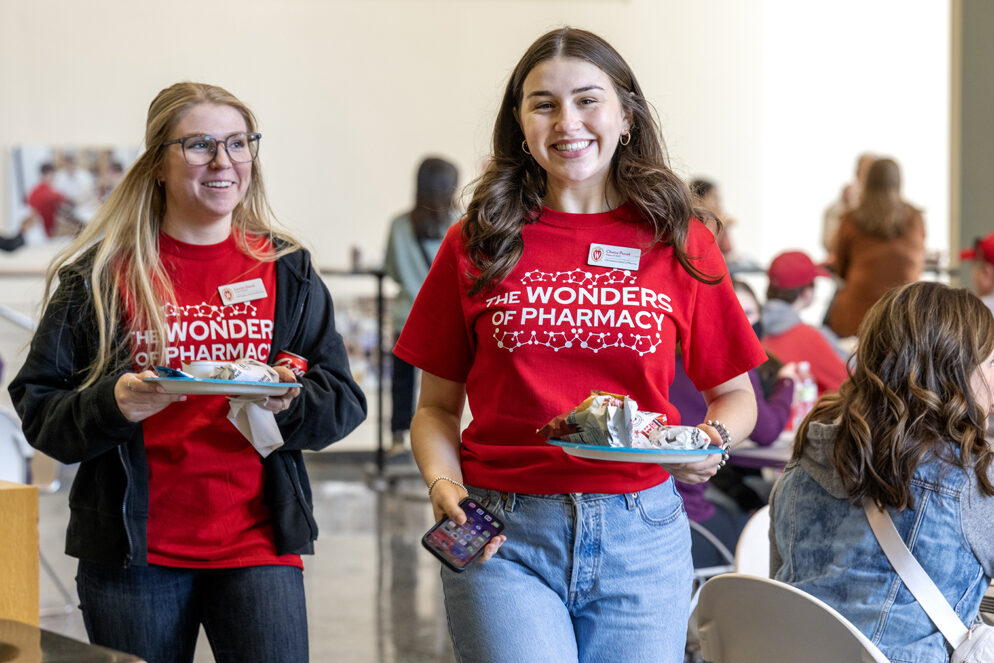 The Wonders of Pharmacy_032024_PLNZ9_5412 First-year PharmD student Chaise Pucek and classmate grab a little lunch before the start of the Wonders of Pharmacy on Saturday, March 2, 2024, at the School of Pharmacy on the campus of UW-Madison. (Photo Paul L. Newby, II)
