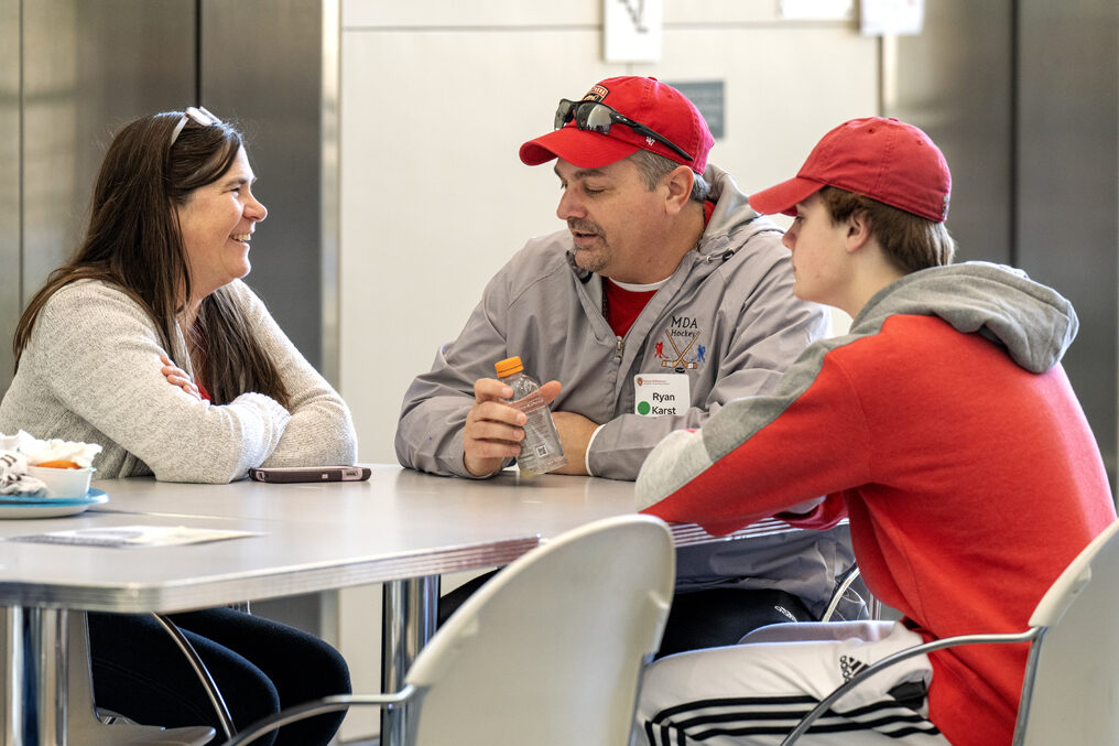 The Wonders of Pharmacy_032024_PLNZ9_5440 Aiden Karst talks with his parents, Ryan and Heather Karst, during lunch before the start of the Wonders of Pharmacy on Saturday, March 2, 2024, at the School of Pharmacy on the campus of UW-Madison. (Photo Paul L. Newby, II)